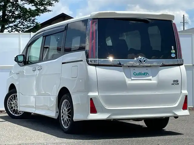 トヨタ ノア ハイブリッド Si ダブルバイビー 岩手県 2018(平30)年 6.8万km ホワイトパールクリスタルシャイン トヨタセーフティセンスC/　　・プリクラッシュセーフティ/　　・レーンディパーチャーアラート/　　・オートマチックハイビーム/フリップダウンモニター/純正メモリナビ/　　BT/CD/DVD/ワンセグ/両側パワースライドドア/クルーズコントロール/LEDオートライト/シートヒーター/純正16インチアルミホイール/スマートキー/ETC