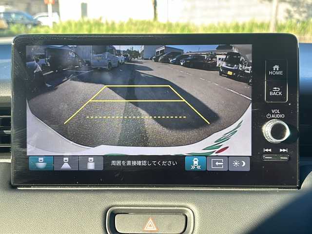 ホンダ ヴェゼル ハイブリッド e:HEV Z 石川県 2025(令7)年 0.4万km プラチナホワイトパール ワンオーナー/ホンダセンシング/・衝突軽減ブレーキ (CMBS)/・車線維持支援システム (LKAS)/・アダプティブクルーズコントロール (ACC)/・標識認識機能/・オートハイビーム/・路外逸脱抑制機能/・誤発進抑制機能・後方誤発進抑制機能/・先行車発進お知らせ機能/ブラインドスポットインフォメーション/マルチビューカメラシステム/ヒルディセントコントロール/純正メーカーオプションナビ/【Bluetooth・USB・フルセグTV】/置くだけ充電/前後ドライブレコーダー/ビルトインETC2.0/ステアリングリモコン/・ステアリングヒーター/・パドルシフト/パワーバックドア/ソナーセンサー/ハーフレザーシート/・前席シートヒーター/オートライト/・LEDヘッドライト/・フォグランプ/電動格納ミラー/・ウィンカーミラー/プッシュスタート/・スペアキー/取扱説明書/保証書