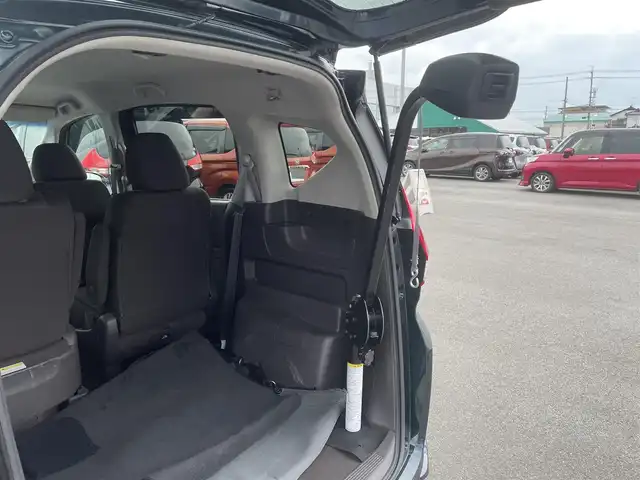 ホンダ フリード G 愛知県 2019(令1)年 4.1万km フォレストグリーンパール 純正９インチナビ/（Bluetooth/フルセグTV/ワンセグTV/SD/CD/DVD/RADIO） /車椅子収納装置/サイドリフトアップシート/運転補助装置/両側電動スライドドア　/C-パッケージ/コンフォートビューパッケージ/ホンダセンシング/レーダークルーズコントロール　/ETC　/LEDヘッドライト　/バックカメラ　/純正ドライブレコーダー　/コーナーセンサー　　/プッシュスタート/左後席パワーシート/スマートキー/ミュージックサーバー/純正フロアマット/オートライト