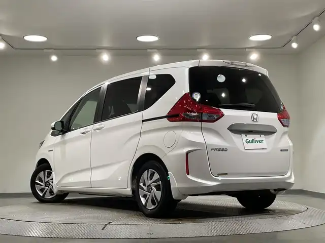 ホンダ フリード ハイブリット G ホンダセンシング 愛知県 2018(平30)年 2.8万km ホワイトオーキッドパール 純正ナビ/（Bluetooth/CD・DVD再生/FM/AM/フルセグTV/SD)/両側パワースライドドア　/ホンダセンシング/衝突軽減ブレーキ　/レーダークルーズコントロール　/車線逸脱警報/先行車発進お知らせ機能/ビルトインＥＴＣ　/ＬＥＤヘッドライト　/バックカメラ　/ドライブレコーダー　/プッシュスタート　/　　-スマートキー/純正フロアマット/後席サンシェード