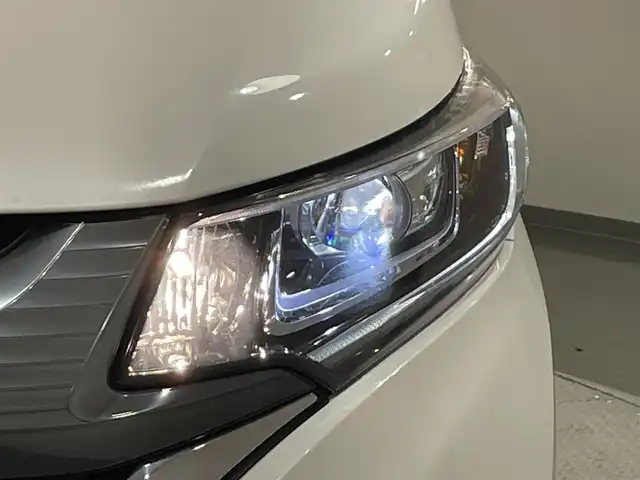 ホンダ フリード ハイブリット G ホンダセンシング 愛知県 2018(平30)年 2.8万km ホワイトオーキッドパール 純正ナビ/（Bluetooth/CD・DVD再生/FM/AM/フルセグTV/SD)/両側パワースライドドア　/ホンダセンシング/衝突軽減ブレーキ　/レーダークルーズコントロール　/車線逸脱警報/先行車発進お知らせ機能/ビルトインＥＴＣ　/ＬＥＤヘッドライト　/バックカメラ　/ドライブレコーダー　/プッシュスタート　/　　-スマートキー/純正フロアマット/後席サンシェード