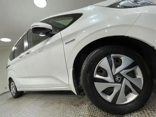 ホンダ フリード ハイブリット G ホンダセンシング 愛知県 2018(平30)年 2.8万km ホワイトオーキッドパール 純正ナビ/（Bluetooth/CD・DVD再生/FM/AM/フルセグTV/SD)/両側パワースライドドア　/ホンダセンシング/衝突軽減ブレーキ　/レーダークルーズコントロール　/車線逸脱警報/先行車発進お知らせ機能/ビルトインＥＴＣ　/ＬＥＤヘッドライト　/バックカメラ　/ドライブレコーダー　/プッシュスタート　/　　-スマートキー/純正フロアマット/後席サンシェード