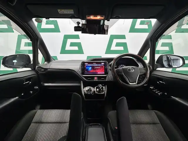 トヨタ ヴォクシー ハイブリッド ZS 煌Ⅱ 鹿児島県 2019(平31)年 7.6万km ブラック ワンオーナー/禁煙車/ナビ/(フルセグTV/Bluetooth/DVD/CD)/フリップダウンモニター/バックカメラ/クルーズコントロール/前席シートヒーター/Toyota Safety Sense/　・プリクラッシュセーフティ/　・レーンディパーチャーアラート/　・オートマチックハイビーム/両側パワースライドドア/ドライブレコーダー/ETC/純正アルミホイール/フロアマット/LEDヘッドライト/オートライト/アイドリングストップ/スマートキー