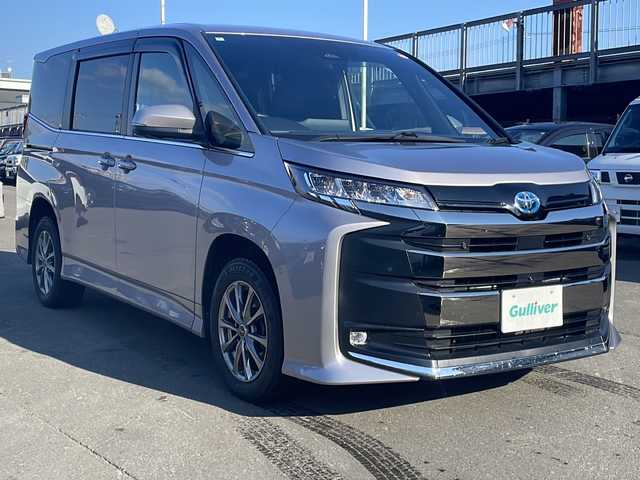 トヨタ ノア ハイブリッド S－Z 道東・釧路十勝 2022(令4)年 9万km メタルストリームM 4WD/ワンオーナー/寒冷地仕様/純正ナビ　/(AM/FM/TV/CD/DVD/BT/Miracast)/ビルトインETC2.0/アラウンドビューモニター/バックカメラ/両側パワースライドドア/ハーフレザーシート/シートヒーター　前席/ステアリングスイッチ/社外16インチAW/純正フロアマット/ウォークスルー/ドアバイザー/サンシェード/アイドリングストップ/パーキングアシスト/レーダークルーズコントロール/前後コーナーセンサー/オートライト/オートマチックハイビーム/ライトレベライザー/フォグランプ/盗難防止装置/ABS/横滑り防止装置/USB入力端子/100V充電