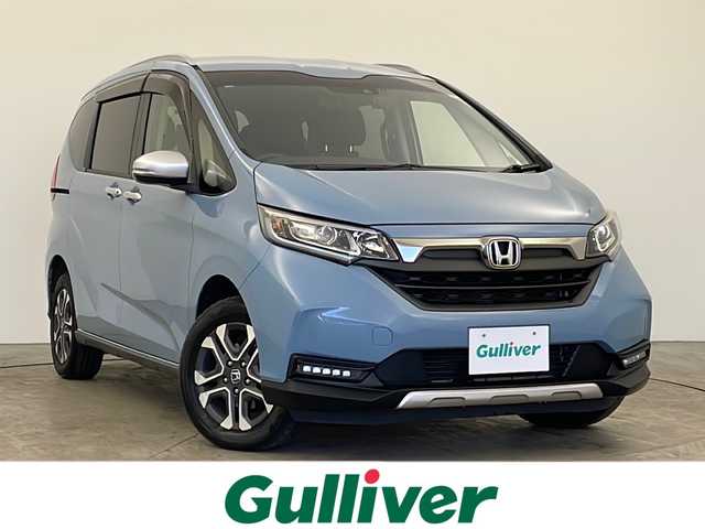 ホンダ フリード クロスター ホンダセンシング 秋田県 2020(令2)年 6万km シーグラスブルーパール 4WD/パイオニアナビ/フルセグTV/AM/FM/CD/DVD/HDMI/Bluetooth/両側パワースライドドア/衝突被害軽減ブレーキ/レーダークルーズコントロール/レーンキープアシスト/横滑り防止装置/先行者発進告知/標識認識機能/アイドリングストップ/バックカメラ/寒冷地仕様/ワイパーデアイサー/前席シートヒーター/LEDヘッドライト/フォグランプ/ビルトインETC/前後ドライブレコーダー/純正フロアマット/純正アルミホイール/サイドバイザー/ハーフレザーシート