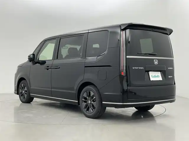 ホンダ ステップワゴン スパーダ eHEV 熊本県 2025(令7)年 0.1千km クリスタルブラックパール 登録済未使用車/純正１１．４インチナビLXM-247VFLi（ＡｐｐｌＣａｒＰｌａｙ・ＡｎｄｒｏｉｄＡｕｔｏ・ＢＴ・フルセグ・ＵＳＢ）/純正15.6インチフリップダウンモニターVM-231FE　/バックカメラ/ホンダセンシング/アダブティブクルーズコントロール/衝突軽減ブレーキ/レーンキープアシスト/ブラインドスポットモニター/アイドリングストップ/横滑り防止/パーキングアシスト/両側パワースライドドア　/前席シートヒーター /パワーバックドア/前後クリアランスソナー/ブレーキホールド/ハーフレザーシート/純正16インチAW/オートライト/オートマチックハイビーム/LEDヘッドライト/フォグライト/スマートキー/プッシュスタート/スペアキー1本/保証書/取扱説明書