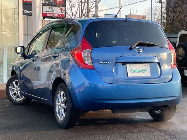 日産 ノート X FOUR 道央・札幌 2015(平27)年 7.6万km シャイニングブルー ・４WD/・衝突軽減ブレーキ/・純正ナビ/　CD＆USB＆TV/・バックカメラ/・レーンキープアシスト/・プッシュスタート/・スマートキー/・電動格納ミラー/・社外AW＆冬タイヤ積込/・純正フロアマット/・ドアバイザー/・ウィンカーミラー/・スペアキー