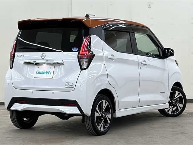 日産 デイズ HWS G ターボ プロパイロットED 道央・札幌 2021(令3)年 1.6万km プレミアムサンシャインオレンジメタリック/シルキーホワイト /4WD//純正ナビ【フルセグ、BT、CD、DVD、USB、AUX】//純正15インチアルミホイール//純正フロアマット//社外エアロ//プロパイロット//クルーズコントロール//前席シートヒーター//アイドリングストップ//オートライト//フォグランプ//LED//ETC//バックカメラ//アラウンドビュー//スペアキー