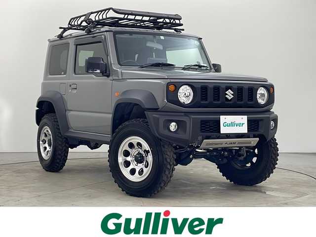 スズキ ジムニー シエラ JL 秋田県 2023(令5)年 1.8万km ミディアムグレー 4WD/5速MT/１１型ALPINEナビ/(フルセグTV/Bluetooth/DVD/CD)/リフトアップ/TERZOキャリア/JAOSフロントガード/プッシュスタート/スマートキー/オートライト/LEDヘッドライト/フォグランプ/前席シートヒーター/AAC/サイドバイザー/純正フロアマット/社外アルミホイール/ビルトインETC2.0/電動格納ミラー