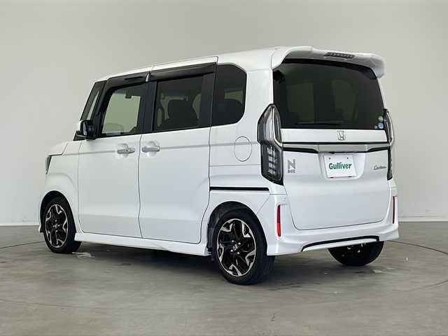 ホンダ Ｎ ＢＯＸ カスタム G EX ターボ ホンダセンシング 新潟県 2018(平30)年 2.3万km プラチナホワイトパール 純正ナビ/バックカメラ/Bluetooth/CD/DVD/USB/フルセグTV/前方ドライブレコーダー/ビルトインETC/パドルシフト/アダプティブクルーズコントロール/ホンダセンシング衝突軽減ブレーキ/リアコーナーセンサー/純正フロアマット/純正アルミホイール/D席シートヒーター/前席レザー調シートカバー
