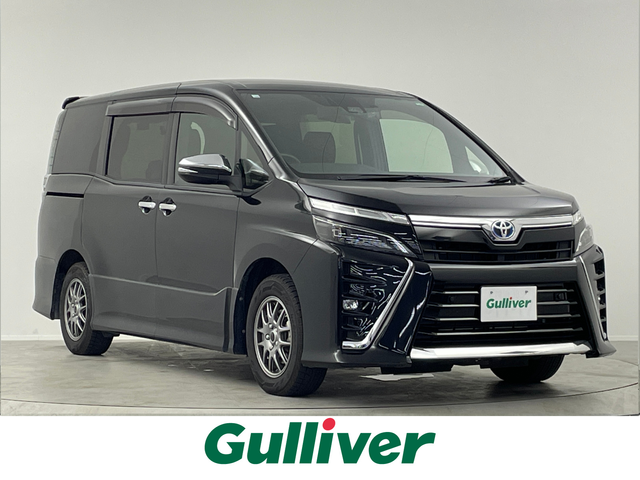 トヨタ ヴォクシー ハイブリッド ZS 煌Ⅱ 埼玉県 2020(令2)年 2.7万km ブラック 純正１０型ナビ　純正１２インチ後席モニター　両側パワースライドドア　クルーズコントロール　デジタルインナーミラー　シートヒーター　左ミラーリバース連動 コーナーセンサー 前後ドライブレコーダー ETC