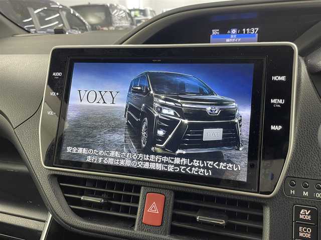 トヨタ ヴォクシー ハイブリッド ZS 煌Ⅱ 埼玉県 2020(令2)年 2.7万km ブラック 純正１０型ナビ　純正１２インチ後席モニター　両側パワースライドドア　クルーズコントロール　デジタルインナーミラー　シートヒーター　左ミラーリバース連動 コーナーセンサー 前後ドライブレコーダー ETC