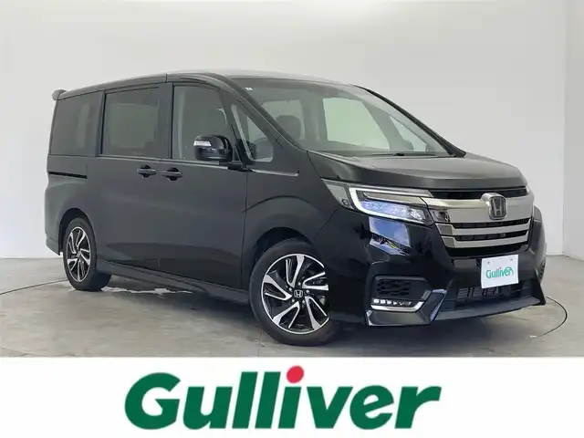 ホンダ ステップワゴン スパーダ クルスピセンシング 富山県 2020(令2)年 1.5万km プレミアムスパークルブラックパール 純正ナビ（AM/FM/CD/DVD/BT）/フルセグＴＶ/バックカメラ/両側パワースライドドア/衝突被害軽減ブレーキ/レーダークルーズコントロール/レーンキープアシスト/前席シートヒーター/ハーフレザーシート/アイドリングストップ/ETC2.0/わくわくゲート/プッシュスタート/LEDヘッドライト/社外フロアマット/保証書/取扱説明書