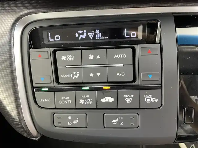 ホンダ ステップワゴン スパーダ クルスピセンシング 富山県 2020(令2)年 1.5万km プレミアムスパークルブラックパール 純正ナビ（AM/FM/CD/DVD/BT）/フルセグＴＶ/バックカメラ/両側パワースライドドア/衝突被害軽減ブレーキ/レーダークルーズコントロール/レーンキープアシスト/前席シートヒーター/ハーフレザーシート/アイドリングストップ/ETC2.0/わくわくゲート/プッシュスタート/LEDヘッドライト/社外フロアマット/保証書/取扱説明書