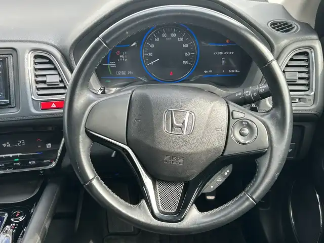 ホンダ ヴェゼル ハイブリッド Z 千葉県 2015(平27)年 4.4万km ミスティックグリーンパール 社外ディスプレイオーディオ　ＦＨ９２００ＤＶ　ＤＶＤ　ＣＤ　シートヒーター　ブレーキホールド　クルーズコントロール　パドルシフト　衝突軽減防止機能　カーテンエアバッグ　純正１７インチＡＷ　ルーフレール