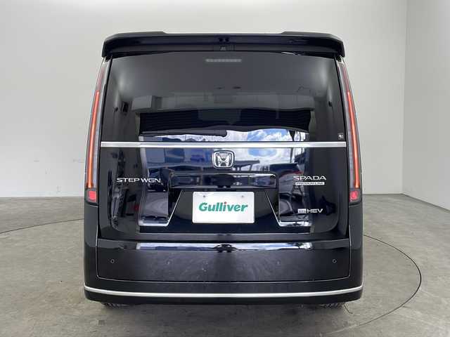 ホンダ ステップワゴン スパーダ eHEV プレミアムライン 兵庫県 2022(令4)年 4.5万km クリスタルブラックパール ・ワンオーナー車/・純正11.4インチナビ（フルセグ・DVD・BT・USB・Aplle Car Play）/・全方位カメラ/・ホンダセンシング/・ステアリングリモコン/・パドルシフト/・パワーバックドア/・両側パワースライドドア/・ハーフレザーシート/・前席シートヒーター/・2列目オットマン/・ホンダセンシング/・衝突軽減ブレーキ（CMBS）/・先行車発進お知らせ機能/・歩行者事故低減ステアリング/・路外逸脱抑制機能/・標識認識機能/・渋滞追従機能付アダプティブクルーズコントロール（ACC）/・車線維持支援システム（LKAS）/・トラフィックジャムアシスト（渋滞運転支援機能）/・ブラインドスポットインフォメーション/・誤発進抑制機能/・後方誤発進抑制機能/・近距離衝突軽減ブレーキ/・急アクセル抑制機能/・パーキングセンサーシステム/・ビルトインETC/・純正前後ドライブレコーダー/・LEDヘッドライト/・フォグランプ/・オートハイビーム/・純正17インチアルミホイール/・純正フロアマット/・スマートキー/・スペアキー/・プッシュスタート/・電動格納ミラー/・W＋サイドエアバック/・カーテンエアバック