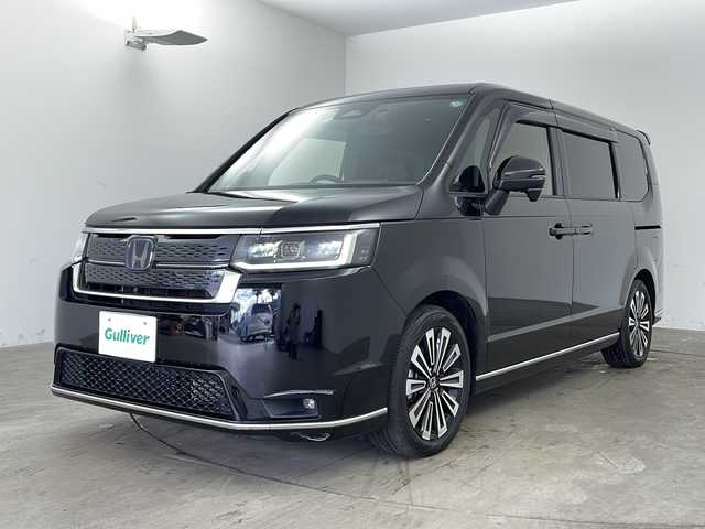 ホンダ ステップワゴン スパーダ eHEV プレミアムライン 兵庫県 2022(令4)年 4.5万km クリスタルブラックパール ・ワンオーナー車/・純正11.4インチナビ（フルセグ・DVD・BT・USB・Aplle Car Play）/・全方位カメラ/・ホンダセンシング/・ステアリングリモコン/・パドルシフト/・パワーバックドア/・両側パワースライドドア/・ハーフレザーシート/・前席シートヒーター/・2列目オットマン/・ホンダセンシング/・衝突軽減ブレーキ（CMBS）/・先行車発進お知らせ機能/・歩行者事故低減ステアリング/・路外逸脱抑制機能/・標識認識機能/・渋滞追従機能付アダプティブクルーズコントロール（ACC）/・車線維持支援システム（LKAS）/・トラフィックジャムアシスト（渋滞運転支援機能）/・ブラインドスポットインフォメーション/・誤発進抑制機能/・後方誤発進抑制機能/・近距離衝突軽減ブレーキ/・急アクセル抑制機能/・パーキングセンサーシステム/・ビルトインETC/・純正前後ドライブレコーダー/・LEDヘッドライト/・フォグランプ/・オートハイビーム/・純正17インチアルミホイール/・純正フロアマット/・スマートキー/・スペアキー/・プッシュスタート/・電動格納ミラー/・W＋サイドエアバック/・カーテンエアバック