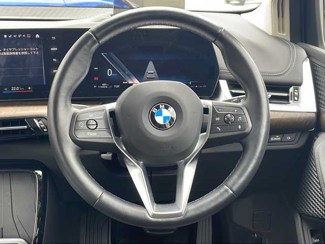 ＢＭＷ ＢＭＷ ２１８ｉ アクティブツアラー エクスクルーシブ 福岡県 2023(令5)年 2.3万km ミネラルホワイト ワンオーナー/純正メーカーナビ/　（Bluetooth・全周囲カメラ・バックカメラ・ラジオ）/レーダークルーズコントロール/ブラインドスポットモニター/ヘッドアップディスプレイ/パワーシート（運転席・助手席）/シートヒーター（運転席・助手席）/メモリーシート（運転席）/ETC/置くだけ充電/Cタイプ入力端子/スペアキー1本/オートパワーウィンドウ（全席）/Assisted Driving/運転注意力モニター/発進サポート/パーキングアシスト/駐車距離コントロール（PDC)/交差点アシスト/エアバック（運転席・助手席）/取扱説明書/保証書