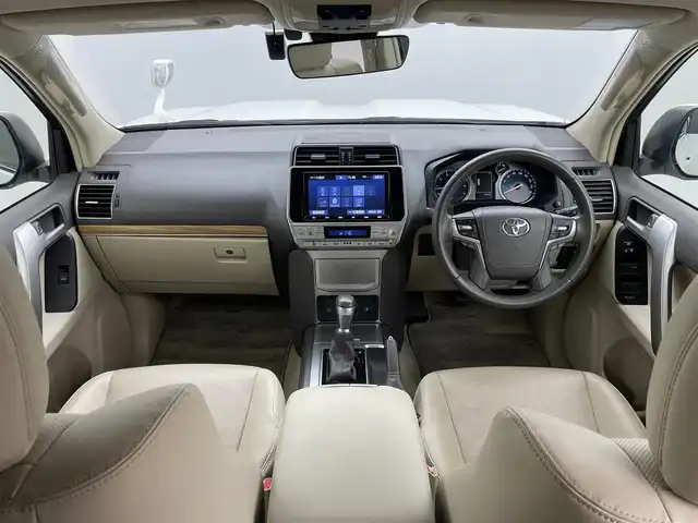 トヨタ ランドクルーザー プラド TX Lパッケージ 岡山県 2022(令4)年 2.7万km ホワイトパールクリスタルシャイン モデリスタエアロ/サンルーフ/純正9インチナビ/・FM/AM/Bluetooth/フルセグ/CD/DVD/バックカメラ/ベージュレザーシート/・パワーシート/・シートヒーター/・ベンチレーション/トヨタセーフティーセンス/・プリクラッシュセーフティ/・レーンディパーチャーアラート/・オートマチックハイビーム/・レーダークルーズコントロール/ビルトインETC/ドライブレコーダー/電動格納サードシート/ブラックルーフレール/LEDヘッドライト/MTモード付シフト/HDMI/USB接続