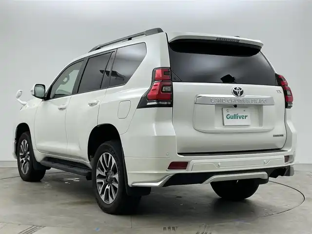トヨタ ランドクルーザー プラド TX Lパッケージ 岡山県 2022(令4)年 2.7万km ホワイトパールクリスタルシャイン モデリスタエアロ/サンルーフ/純正9インチナビ/・FM/AM/Bluetooth/フルセグ/CD/DVD/バックカメラ/ベージュレザーシート/・パワーシート/・シートヒーター/・ベンチレーション/トヨタセーフティーセンス/・プリクラッシュセーフティ/・レーンディパーチャーアラート/・オートマチックハイビーム/・レーダークルーズコントロール/ビルトインETC/ドライブレコーダー/電動格納サードシート/ブラックルーフレール/LEDヘッドライト/MTモード付シフト/HDMI/USB接続
