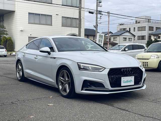 アウディ Ａ５ SB 2．0 TFSI スポーツ 福井県 2018(平30)年 3.1万km グレイシアホワイトメタリック 登録時走行距離３０６３４ｋｍ/Sラインパッケージ/メーカー純正HDDナビゲーション/（CD/DVD/BT）/フルセグテレビ/バーチャルコックピット/プリクラッシュセーフティ/レーンキープアシスト/アダプティブクルーズコントロール/パークアシスト/クリアランスソナー/LEDヘッドライト/電動リアゲート/純正18インチアルミホイール/前席パワーシート/ハーフレザーシート/シートヒーター/パドルシフト/フロントカメラ/サイドカメラ/バックカメラ/ETC2.0 /ドライブレコーダー/プッシュスタート/スマートキー/保証書/取扱説明書