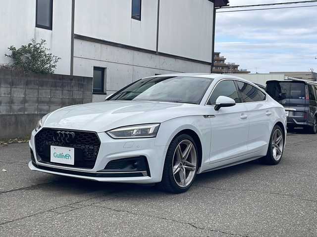 アウディ Ａ５ SB 2．0 TFSI スポーツ 福井県 2018(平30)年 3.1万km グレイシアホワイトメタリック 登録時走行距離３０６３４ｋｍ/Sラインパッケージ/メーカー純正HDDナビゲーション/（CD/DVD/BT）/フルセグテレビ/バーチャルコックピット/プリクラッシュセーフティ/レーンキープアシスト/アダプティブクルーズコントロール/パークアシスト/クリアランスソナー/LEDヘッドライト/電動リアゲート/純正18インチアルミホイール/前席パワーシート/ハーフレザーシート/シートヒーター/パドルシフト/フロントカメラ/サイドカメラ/バックカメラ/ETC2.0 /ドライブレコーダー/プッシュスタート/スマートキー/保証書/取扱説明書