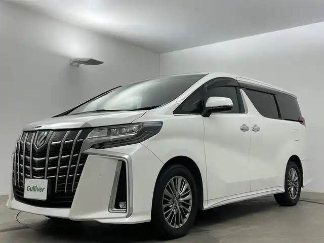 トヨタ アルファード エグゼクティブ ラウンジ S 岡山県 2018(平30)年 8.9万km ホワイトパールクリスタルシャイン サンルーフ/JBLサウンド/本革シート/4WD/12.1インチフリップダウンモニター/純正9インチディスプレイオーディオ/（フルセグTV/Bluetooth/HDMI接続/USB接続/CD/DVD/Blu-ray)/アラウンドビューモニター/デジタルインナーミラー/ビルトインETC2.0/三眼LEDヘッドライト/オートハイビーム/パワーシート（D/N）/シートヒーター/エアシート/ステアリングヒーター/レーダークルーズコントロール/衝突軽減ブレーキシステム/両側パワースライドドア/電動リアゲート/プッシュスタート/新車保証書/取扱説明書/スマートキー×2