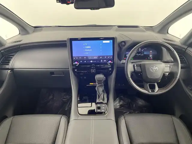 トヨタ アルファードハイブリット Z 埼玉県 2024(令6)年 0.7万km プラチナホワイトパールマイカ 衝突被害軽減ブレーキ/純正14インチディスプレイオーディオナビ（あり）/フリップダウンモニター/三眼LEDヘッドライト/全方位カメラ/両側パワースライドドア/ガラスルーフ/レーダークルーズコントロール/シートヒーター/エアシート/フルセグTV/Bluetooth/バックカメラ/電動リアゲート/パワーシート/ヘッドアップディスプレイ/コーナーセンサー/純正アルミホイール/ETC2.0/ブラインドスポットモニター/パドルシフト/ステアリングヒーター/リアオートエアコン/オートマチックハイビーム/置くだけ充電器/ドライブレコーダー/ステアリングスイッチ/スマートキー/プッシュスタート