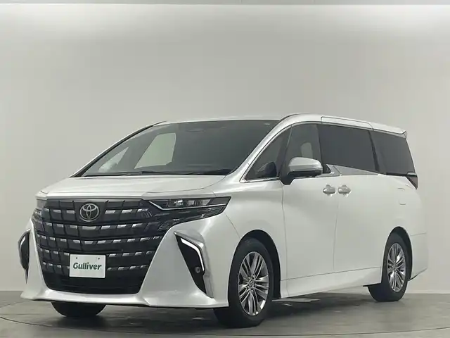 トヨタ アルファードハイブリット Z 埼玉県 2024(令6)年 0.7万km プラチナホワイトパールマイカ 衝突被害軽減ブレーキ/純正14インチディスプレイオーディオナビ（あり）/フリップダウンモニター/三眼LEDヘッドライト/全方位カメラ/両側パワースライドドア/ガラスルーフ/レーダークルーズコントロール/シートヒーター/エアシート/フルセグTV/Bluetooth/バックカメラ/電動リアゲート/パワーシート/ヘッドアップディスプレイ/コーナーセンサー/純正アルミホイール/ETC2.0/ブラインドスポットモニター/パドルシフト/ステアリングヒーター/リアオートエアコン/オートマチックハイビーム/置くだけ充電器/ドライブレコーダー/ステアリングスイッチ/スマートキー/プッシュスタート