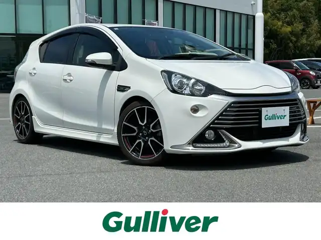 トヨタ アクア G G’s 奈良県 2014(平26)年 4.9万km ライムホワイトパールクリスタルシャイン 純正ナビ　/フルセグＴＶ　/Ｂｌｕｅｔｏｏｔｈ　/ＥＴＣ　/バックカメラ/ドライブレコーダー　/純正アルミホイール　/純正フロアマット　/社外テールランプ　/社外マフラー　/スペアキー　/ＬＥＤヘッドライト　/オートライト　/エアバッグ