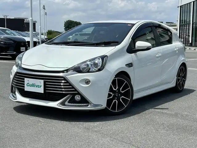 トヨタ アクア G G’s 奈良県 2014(平26)年 4.9万km ライムホワイトパールクリスタルシャイン 純正ナビ　/フルセグＴＶ　/Ｂｌｕｅｔｏｏｔｈ　/ＥＴＣ　/バックカメラ/ドライブレコーダー　/純正アルミホイール　/純正フロアマット　/社外テールランプ　/社外マフラー　/スペアキー　/ＬＥＤヘッドライト　/オートライト　/エアバッグ