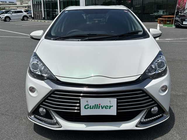 トヨタ アクア G G’s 大阪府 2014(平26)年 4.9万km ライムホワイトパールクリスタルシャイン 純正ナビ　/フルセグＴＶ　/Ｂｌｕｅｔｏｏｔｈ　/ＥＴＣ　/バックカメラ/ドライブレコーダー　/純正アルミホイール　/純正フロアマット　/社外テールランプ　/社外マフラー　/スペアキー　/ＬＥＤヘッドライト　/オートライト　/エアバッグ