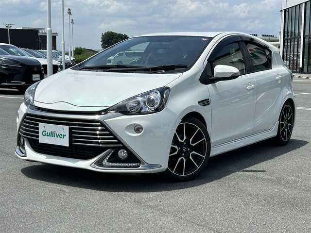 トヨタ アクア G G’s 大阪府 2014(平26)年 4.9万km ライムホワイトパールクリスタルシャイン 純正ナビ　/フルセグＴＶ　/Ｂｌｕｅｔｏｏｔｈ　/ＥＴＣ　/バックカメラ/ドライブレコーダー　/純正アルミホイール　/純正フロアマット　/社外テールランプ　/社外マフラー　/スペアキー　/ＬＥＤヘッドライト　/オートライト　/エアバッグ