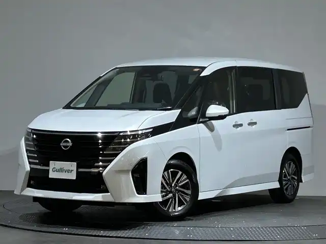 日産 セレナ ハイウェイスター V 愛媛県 2025(令7)年 0.1万km未満 プリズムホワイト 12.3インチ純正ディスプレイオーディオ　全方位カメラ　フルセグTV　寒冷地仕様　ETC　フリップダウンモニター 前後ドライブレコーダー シートヒーター　純正アルミホイール　コーナーセンサー ステアリングヒーター　