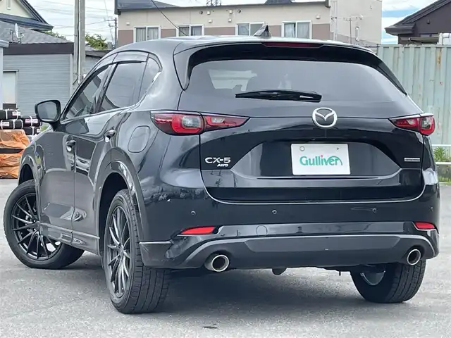 マツダ ＣＸ－５ 25S スポーツアピアランス 道央・札幌 2023(令5)年 3.4万km ジェットブラックマイカ ４WD/ワンオーナー/BOSEプレミアムサウンドシステム/純正メーカーナビ/CD/DVD/BT/フルセグ/衝突被害軽減ブレーキ/横滑り防止装置/レーダークルーズコントロール/レーンキープアシスト/オフロードトランクションアシスト/クリアランスソナー/ブラインドスポットモニター/アラウンドビューモニター/ETC/ドライブレコーダー/アイドリングストップ/SPORTMODE/パワーバックドア/前席パワーシート/D席メモリーシート/前席シートヒーター/レザーシート/革巻きステアリング/ステアリングリモコン/パドルシフト/ハンドルヒーター/置くだけ充電/電動パーキング/オートブレーキホールド/MTモード付AT/プッシュスタート/スマートキー/LEDヘッドライト/オートライト/オートハイビーム/電動格納ミラー/ウィンカーミラー/純正ラバーフロアマット/ドアバイザー/純正AW付夏タイヤ積込/225/55/R19/223年/山5mm