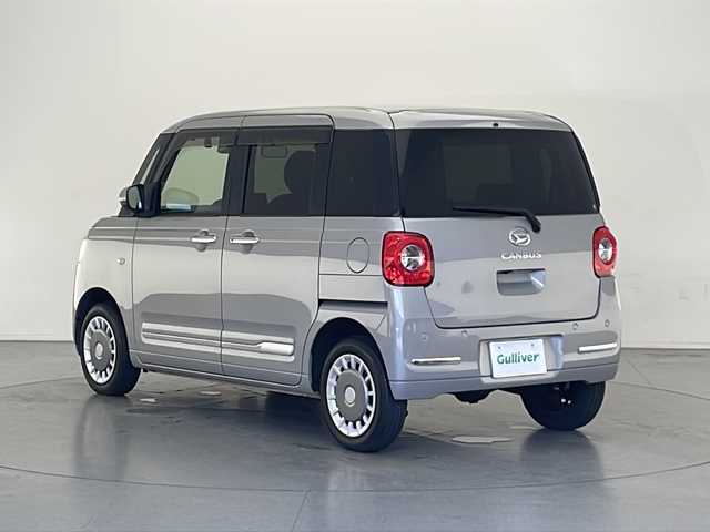 ダイハツ ムーヴ キャンバス セオリー G 長野県 2022(令4)年 1.1万km グレーマイカM ４WD/純正ディスプレイオーディオ/フルセグTV/Bluetooth Audio/USB/HDMI接続/バックカメラ/全方位カメラ/スマートアシスト/両側パワースライドドア /アイドリングストップ/革調シートカバー/LEDヘッドライト/オートライト/フォグランプ/オートマチックハイビーム/前席シートヒーター/スマートキー/プッシュスタート