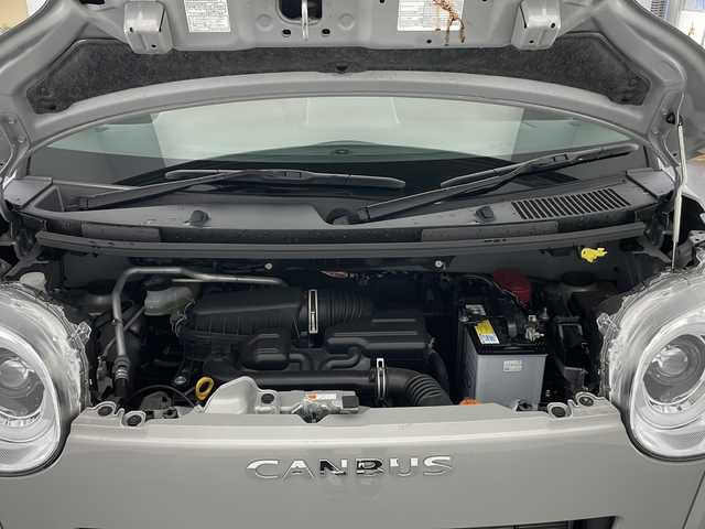 ダイハツ ムーヴ キャンバス セオリー G 長野県 2022(令4)年 1.1万km グレーマイカM ４WD/純正ディスプレイオーディオ/フルセグTV/Bluetooth Audio/USB/HDMI接続/バックカメラ/全方位カメラ/スマートアシスト/両側パワースライドドア /アイドリングストップ/革調シートカバー/LEDヘッドライト/オートライト/フォグランプ/オートマチックハイビーム/前席シートヒーター/スマートキー/プッシュスタート