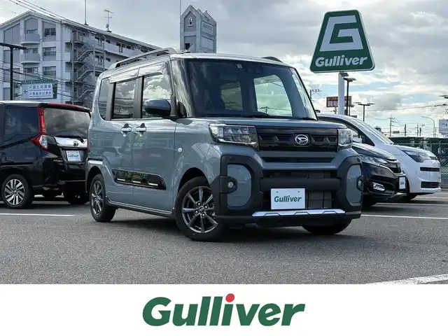 ダイハツ タント ファンクロス 大分県 2023(令5)年 1万km レイクブルーメタリック ・純正ナビ(CD/DVD/SD/USB)/・バックカメラ/・フルセグテレビ/・両側パワースライドドア/・スマートアシスト/・コーナーセンサー/・ドライブレコーダー/・ETC/・シートヒーター/・オートハイビーム/・純正フロアマット/・純正アルミホイール