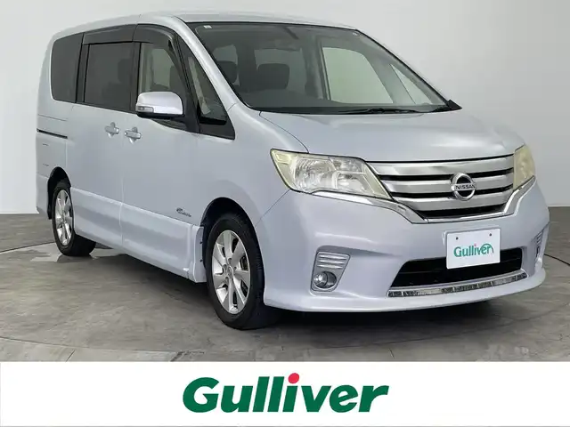 日産 セレナ ハイウェイスター Sハイブリッド 大分県 2013(平25)年 11.7万km エターナルスノーホワイト 純正ディーラーナビ【HMS512-D】/・フルセグTV/・AM/FM/・DISC/バックカメラ/後席用モニター/ドライブレコーダー/ウインカーミラー/片側パワースライドドア/クルーズコントロール/オートライト/プッシュスタート/スマートキー/パワーウィンドウ/パワーステアリング/横滑り防止システム