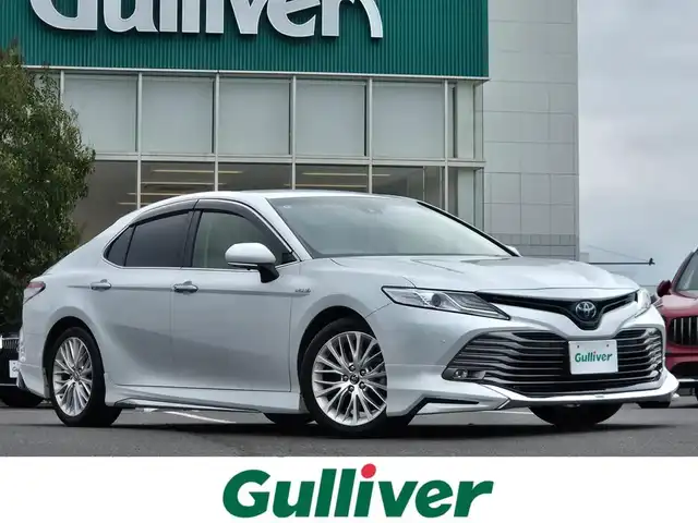 トヨタ カムリ G レザーパッケージ 鹿児島県 2018(平30)年 7.1万km グラファイトブラックガラスフレーク モデリスタエアロ　/レーダークルーズコントロール　/ビルトインＥＴＣ　/ドライブレコーダー　/トヨタセーフティセンス　/ブラインドスポットモニター　/純正ＳＤナビ　/Ｂｌｕｅｔｏｏｔｈオーディオ　/前後コーナーセンサー/純正アルミホイール(18インチ)/横滑り防止装置/レーンキープアシスト/ＭＴモード付きＡＴ/D+N席パワーシート/D+N席シートヒーター/横滑り防止装置/プッシュスタート/スマートキー/カーテンエアバッグ(W+サイド)