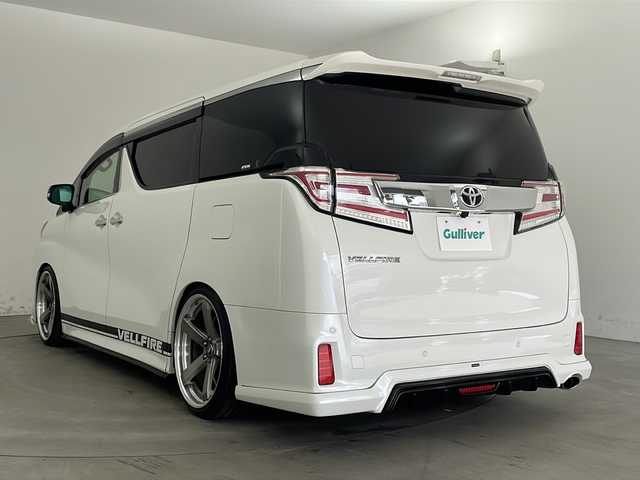 トヨタ ヴェルファイア Z Gエディション 兵庫県 2016(平28)年 4.5万km ホワイトパールクリスタルシャイン ・アルパインBIGXナビ/・CD・DVD・BT・SD/・フルセグTV/・バックカメラ/・ビルトインETC/・サンルーフ/・両側パワースライドドア/・社外デジタルインナーミラー/・GPSレーダー/・レーダークルーズコントロール/・インテリジェンスクリアランスソナー/・クリアランスソナー/・AC１００V充電/・前方ドライブレコーダー/・電動リアゲート/・電動パーキングブレーキ/・オートホールド/・ステアリングヒーター/・ステアリングスイッチ/・レザーシート/・シートヒーター/・前席パワーシート/・運転席パワーシートメモリ機能/・アルパイン12.8インチ後席モニター/・テイン車高調/・MTモード付AT/・シルクブレイズ社外エアロ/・LEDヘッドライト/・フォグランプ/・社外LEDテールランプ（純正積載）/・純正ドアバイザー/・純正フロアマット/・電動格納ミラー/・WORK社外21インチホイール/・スマートキー