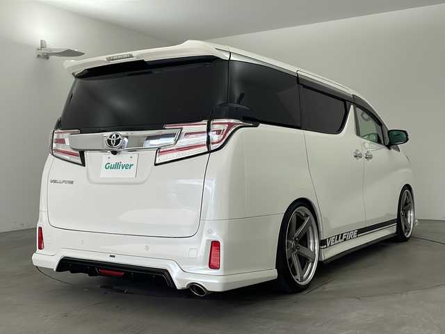 トヨタ ヴェルファイア Z Gエディション 兵庫県 2016(平28)年 4.5万km ホワイトパールクリスタルシャイン ・アルパインBIGXナビ/・CD・DVD・BT・SD/・フルセグTV/・バックカメラ/・ビルトインETC/・サンルーフ/・両側パワースライドドア/・社外デジタルインナーミラー/・GPSレーダー/・レーダークルーズコントロール/・インテリジェンスクリアランスソナー/・クリアランスソナー/・AC１００V充電/・前方ドライブレコーダー/・電動リアゲート/・電動パーキングブレーキ/・オートホールド/・ステアリングヒーター/・ステアリングスイッチ/・レザーシート/・シートヒーター/・前席パワーシート/・運転席パワーシートメモリ機能/・アルパイン12.8インチ後席モニター/・テイン車高調/・MTモード付AT/・シルクブレイズ社外エアロ/・LEDヘッドライト/・フォグランプ/・社外LEDテールランプ（純正積載）/・純正ドアバイザー/・純正フロアマット/・電動格納ミラー/・WORK社外21インチホイール/・スマートキー