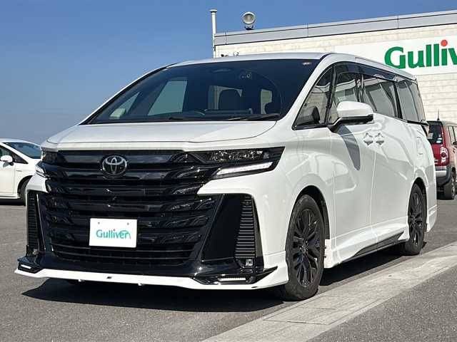 トヨタ ヴェルファイア ハイブリット Z プレミア 香川県 2023(令5)年 6.7万km プラチナホワイトパールマイカ 純正14インチHDディスプレイオーディオPlus（フルセグTV/BT)/アラウンドユーモニター/ブラインドスポットモニター/デジタルインナーミラー/後席モニター/ドライバーモニター/純正GRエアロ（フロント，サイド，リア）/両側パワースライドドア/サンルーフ/3列シート/電動リアゲート/ドライブレコーダー/パワーシート/シートヒーター/エアシート/コーナーセンサー/オートマチックハイビーム/シートメモリー/社外マフラー/ビルトインETC2.0