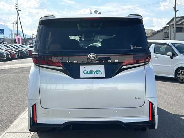 トヨタ ヴェルファイア ハイブリット Z プレミア 香川県 2023(令5)年 6.7万km プラチナホワイトパールマイカ 純正14インチHDディスプレイオーディオPlus（フルセグTV/BT)/アラウンドユーモニター/ブラインドスポットモニター/デジタルインナーミラー/後席モニター/ドライバーモニター/純正GRエアロ（フロント，サイド，リア）/両側パワースライドドア/サンルーフ/3列シート/電動リアゲート/ドライブレコーダー/パワーシート/シートヒーター/エアシート/コーナーセンサー/オートマチックハイビーム/シートメモリー/社外マフラー/ビルトインETC2.0