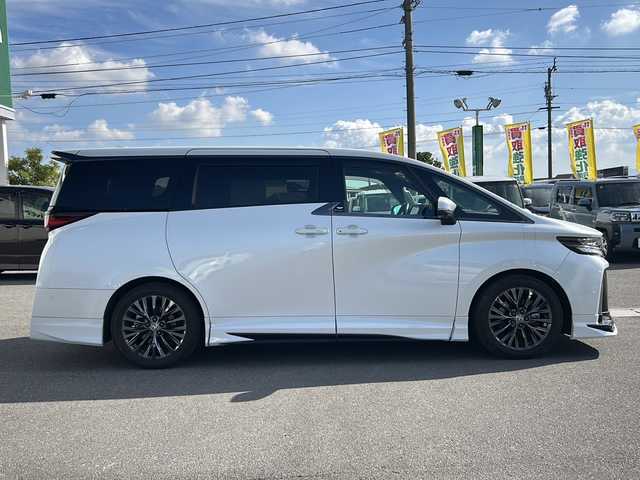 トヨタ ヴェルファイア ハイブリット Z プレミア 香川県 2023(令5)年 6.7万km プラチナホワイトパールマイカ 純正14インチHDディスプレイオーディオPlus（フルセグTV/BT)/アラウンドユーモニター/ブラインドスポットモニター/デジタルインナーミラー/後席モニター/ドライバーモニター/純正GRエアロ（フロント，サイド，リア）/両側パワースライドドア/サンルーフ/3列シート/電動リアゲート/ドライブレコーダー/パワーシート/シートヒーター/エアシート/コーナーセンサー/オートマチックハイビーム/シートメモリー/社外マフラー/ビルトインETC2.0