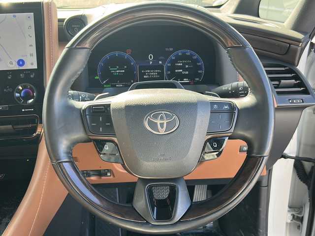 トヨタ ヴェルファイア ハイブリット Z プレミア 香川県 2023(令5)年 6.7万km プラチナホワイトパールマイカ 純正14インチHDディスプレイオーディオPlus（フルセグTV/BT)/アラウンドユーモニター/ブラインドスポットモニター/デジタルインナーミラー/後席モニター/ドライバーモニター/純正GRエアロ（フロント，サイド，リア）/両側パワースライドドア/サンルーフ/3列シート/電動リアゲート/ドライブレコーダー/パワーシート/シートヒーター/エアシート/コーナーセンサー/オートマチックハイビーム/シートメモリー/社外マフラー/ビルトインETC2.0