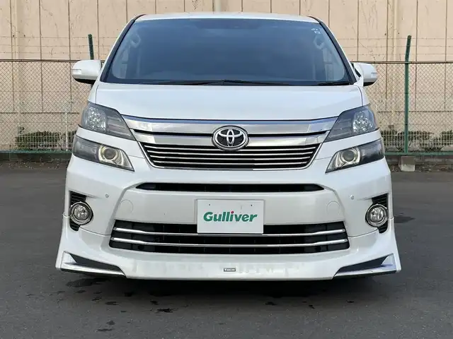 トヨタ ヴェルファイア 2．4Z ゴールデンアイズ 東京都 2013(平25)年 7.6万km ホワイトパールクリスタルシャイン 純正８型ナビ　/後席１１型モニター　/モデリスタエアロ　/電動リアゲート　/ハーフレザー　/両側電動ドア　/クルーズコントロール　/ビルトインＥＴＣ　/純正１８インチＡＷ　/社外１８インチＡＷ車載　/禁煙
