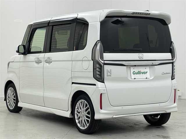 ホンダ Ｎ ＢＯＸ カスタム L ターボ 茨城県 2022(令4)年 2.1万km プラチナホワイトパール 純正7インチナビ/フルセグTV/BTオーディオ/CD/DVD/SD/USB/バックカメラ/両側パワースライドドア/LEDヘッドライト/ビルトインETC/純正ドライブレコーダー前後/革巻きステアリング/ハーフレザーシート/前席シートヒーター/純正15インチAW