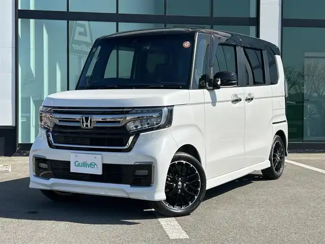 ホンダ Ｎ ＢＯＸ カスタム L ターボ 和歌山県 2021(令3)年 1.4万km プラチナホワイトパール 社外ナビ/ワンセグTV/バックカメラ/（CD/DVD/BT）/衝突軽減ブレーキ/クルーズコントロール/レーンキープアシスト/コーナーセンサー/横滑り抑制機能/両側パワースライドドア/純正フロアマット/純正アルミホイール/ETC/前後ドライブレコーダー/アイドリングストップ/LEDヘッドライト/フォグランプ/オートライト/オートマチックハイビーム