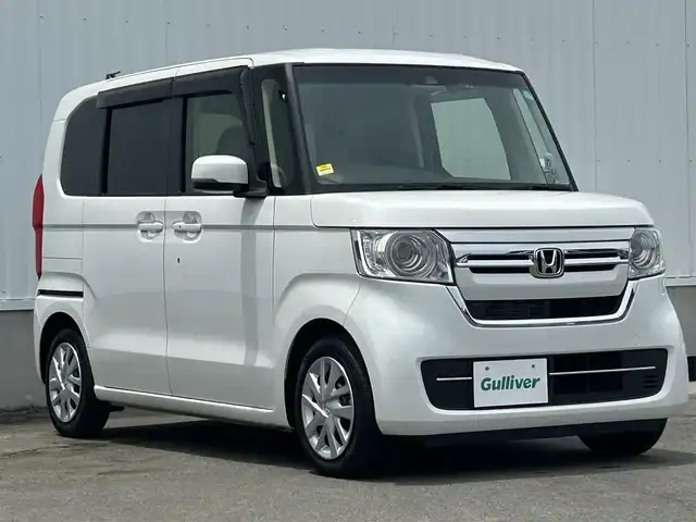 ホンダ Ｎ ＢＯＸ L ターボ 愛媛県 2023(令5)年 1.5万km プラチナホワイトパール 純正ナビ（SD/DVD/バックカメラ/Bluetooth）/純正アルミホイール14/純正フロアマット/両側パワースライドドア/ABS/横滑り防止装置/コーナーセンサー/レーンアシスト/オートライト/衝突被害軽減システム/ダブル＋サイドエアバック/カーテンエアバック/ETC/LEDライト